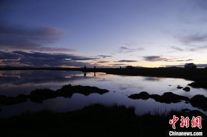 圖為夕陽下的查旦濕地?！●R銘言 攝