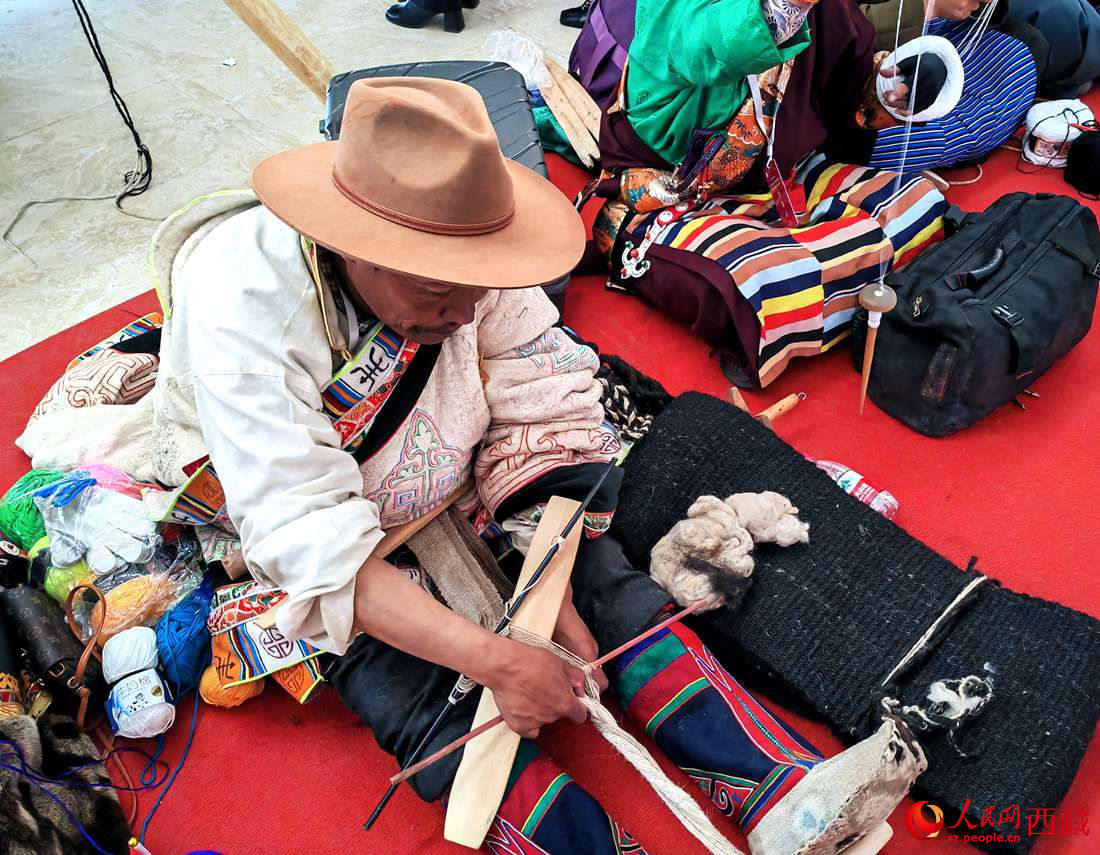 編織技能展示。人民網(wǎng) 李海霞攝