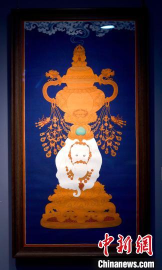 圖為5月16日，展覽中的新創(chuàng)唐卡作品《瑞象承香》。　李林 攝